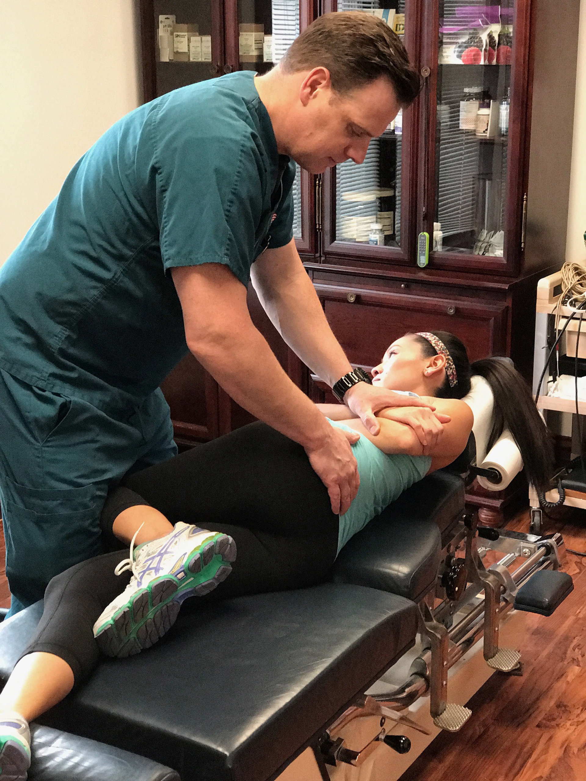 Hands-on chiropractic and rehab treatment for back pain in Naperville