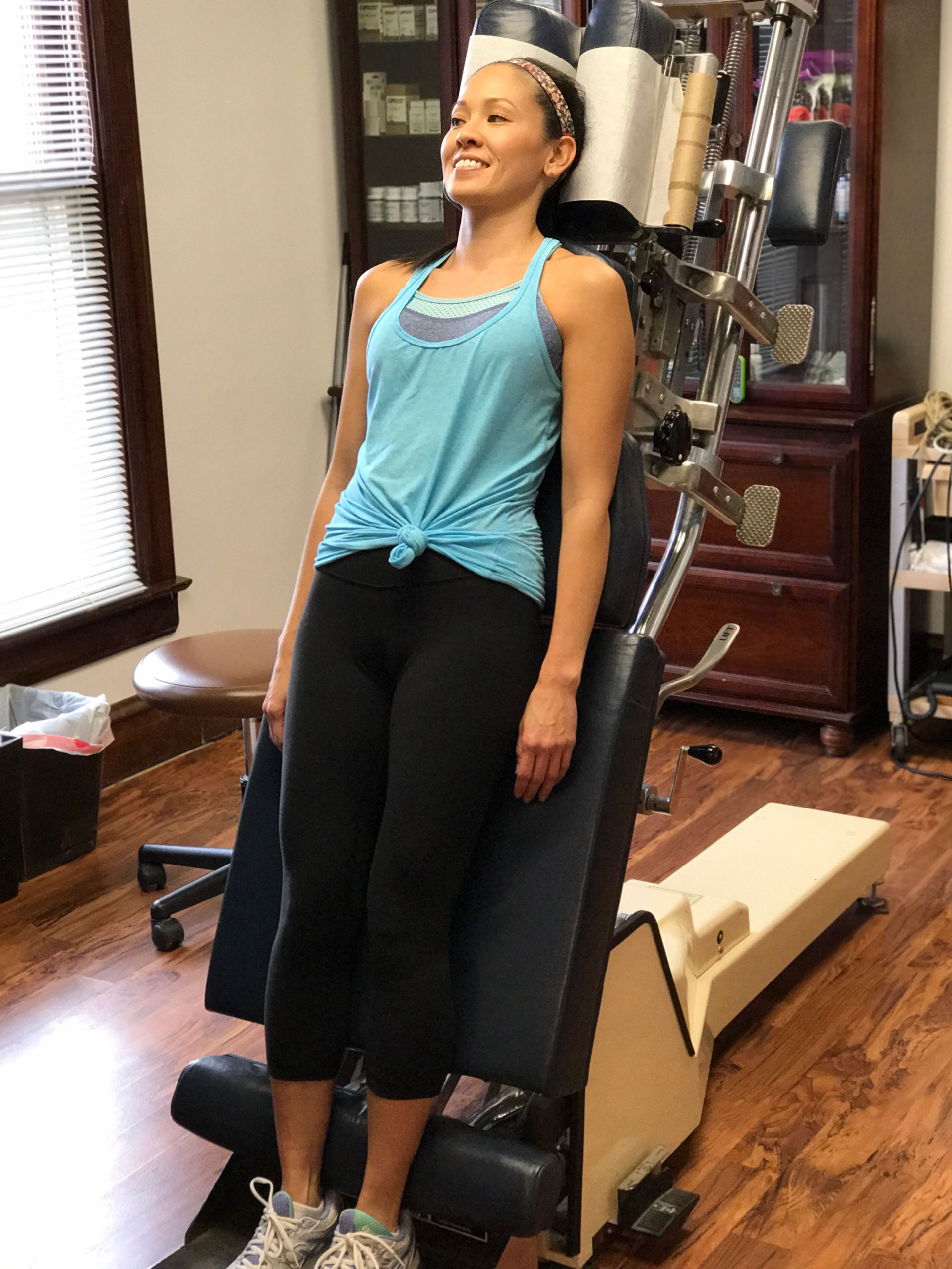 Hands-on chiropractic care at Pure Health and Wellness in downtown Naperville