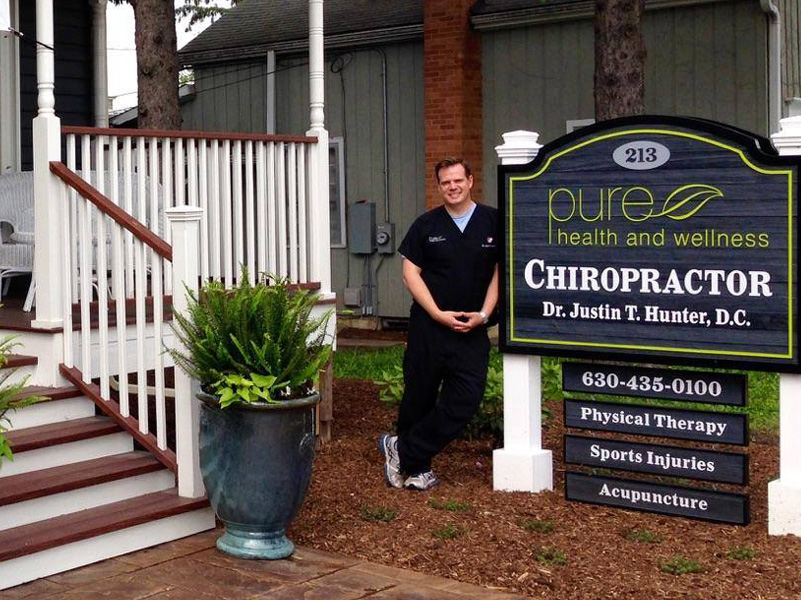 Dr. Justin Hunter outside Pure Health and Wellness at 213 W. Jefferson Avenue, downtown Naperville